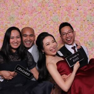 A fun-filled photo session at a wedding with iCanvas booth.