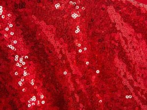 Sparkling red sequin backdrop for glamorous events.