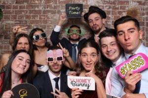 Guests interacting with the GIF booth at a party.